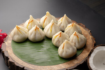 Steamed Modak, white modak, ukdiche modak made from rice flour and coconut jaggery filling. Modak is a traditional Indian sweet made during Ganesh Utsav