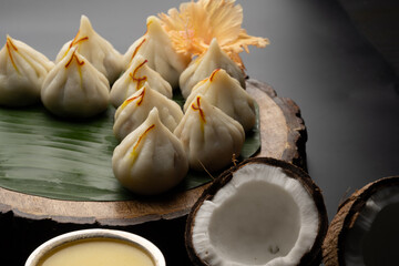 Steamed Modak, white modak, ukdiche modak made from rice flour and coconut jaggery filling. Modak is a traditional Indian sweet made during Ganesh Utsav