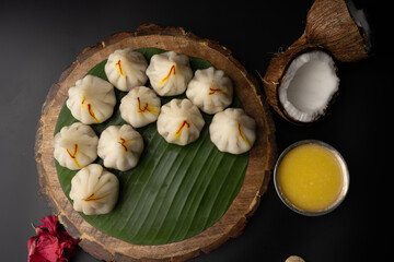 Steamed Modak, white modak, ukdiche modak made from rice flour and coconut jaggery filling. Modak is a traditional Indian sweet made during Ganesh Utsav