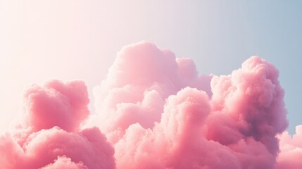 A pink and white cloud that is in the sky
