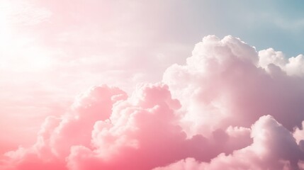 A pink and white cloud that is in the sky