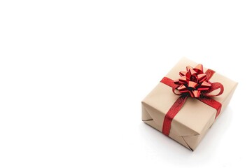 Obraz premium Minimalist Brown Gift Box with Red Ribbon on White Background