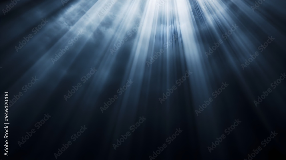 Poster conceptual image depicting light breaking through the darkness with rays piercing the shadows creati