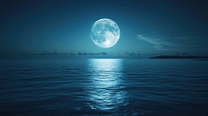 A full blue moon casting a soft glow over a tranquil ocean at night.