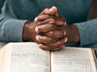 Closeup, hands and person reading bible in spiritual religion for peace, guidance and learning....