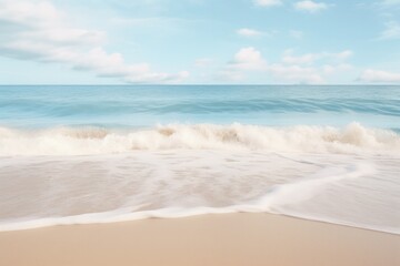 A wide-angle shot of a serene ocean landscape with gentle waves lapping against a sandy beach symbolizing Earth's diverse ecosystems