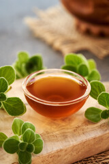 A bowl of homemade Plectranthus amboinicus syrup for common cold