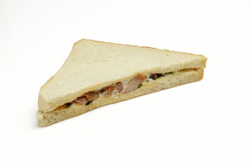 Thin triangle shape chicken club sandwich isolated on white background