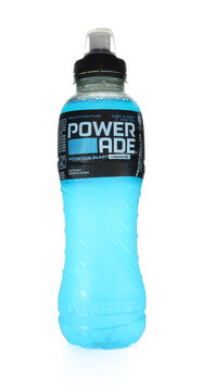 Powerade mountain blast blue isotonic sports drink bottle isolated on white background