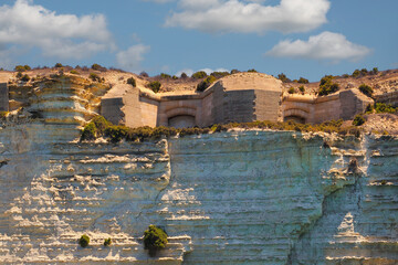 Malta, the area around the fishing village of Marsaxlokk, with World War II defensive bunkers in the foreground