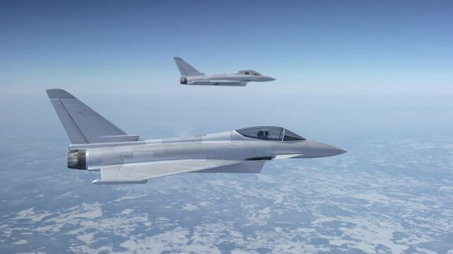 Military jets flying above the clouds. Close up on fighter airplanes.