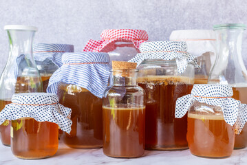 homebrew fermented drink Kombucha in a glass bottle jar, Kombucha SCOBY 