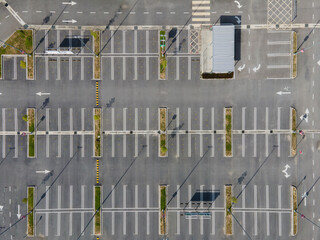Top-down aerial view of empty car parking lots.