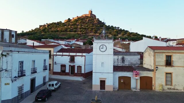 Clock Tower and Miraflores Castle in Alconchel, Badajoz, Extremadura, Spain