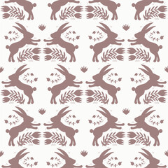 Vintage rabbit pattern in muted dusty pink on an off-white background. Symmetrical animal silhouette and floral motifs design in a folk art style. Festive vibe is great for Easter and Christmas.