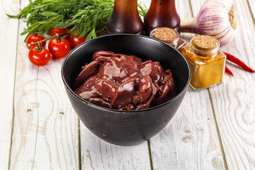 Raw chicken liver uncooked in the bowl