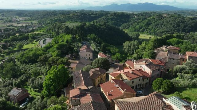 Orbiting Crespina Lorenzana Town In The Province Of Pisa, Tuscany, Italy. Aerial Shot