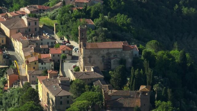 Hotel Accommodation In The Medieval Town Of Lorenzana In The Province of Pisa, Italy. Aerial Drone Shot