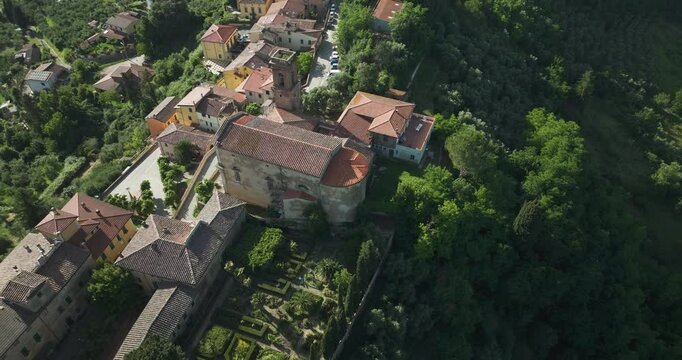 La Chiesa di San Bartolomeo Apostolo Catholic Church In Lorenzana, Pisa, Italy. Aerial Shot