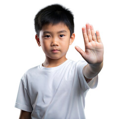 Young Boy Holding Up His Hand In Stop Gesture