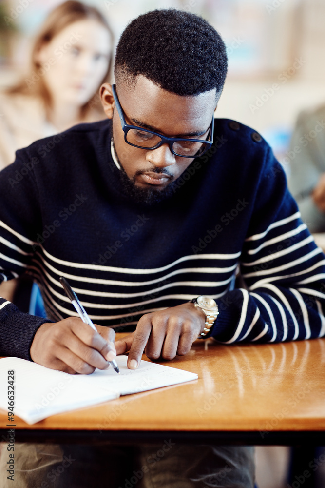 Poster Student, writing and man learning in exam class for education, knowledge or test preparation in college. University, guy and studying with book for help, project notes and reading scholarship report