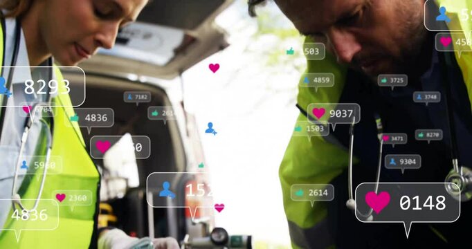 Social media interaction icons animation over paramedics assisting patient near ambulance