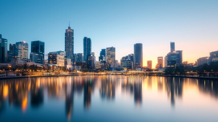 Fototapeta premium City skyline at dusk with glowing skyscrapers reflecting on a calm river, urban glowtime, serene and modern