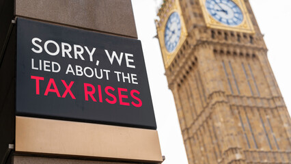 Sorry, we lied about the tax rises sign in front of Westminster	