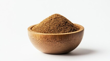Heap of garam masala spice blend in a small wooden bowl, with a light dusting around it on a white background, no people.