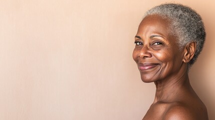 Obraz premium Happy woman with short gray hair wearing earrings