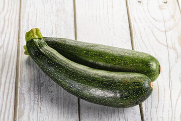 Raw young small green zucchini