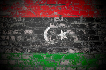 Flag of Libya on brick wall