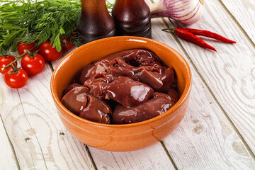 Raw chicken liver uncooked in the bowl