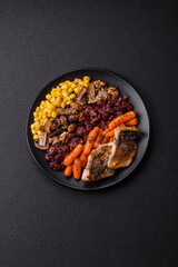 A colorful vegetarian dish consists of fish, beans, corn, mushrooms