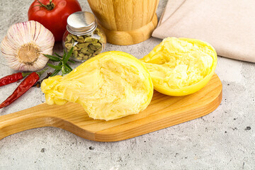 Italian traditional yellow Scamorza cheese