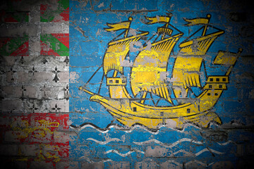 Flag of Saint Pierre and Miquelon on brick wall
