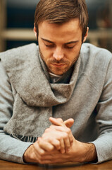 Obraz premium Belief, faith and religion with man praying to God for assistance, guidance or spiritual help. Hope, prayer and trust with Christian person talking to Jesus for confession, inspiration or mindfulness