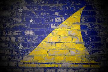 Flag of Tokelau on brick wall