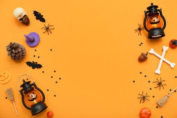 Composition with different decorations for Halloween on orange background