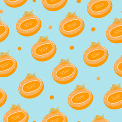 Seamless pattern with pieces of orange soap on a blue background. Soap with foam in vector