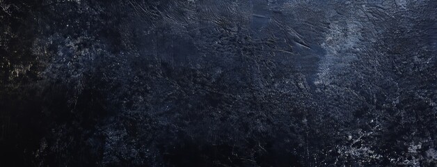 The background is blackstone with a grey cement texture. This is a top view, flat lay of the stone