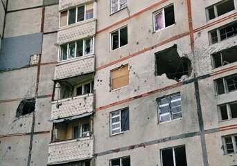 Destroyed apartment buildings due to war and shelling with rockets and artillery