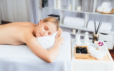 Caucasian woman customer enjoying relaxing anti-stress spa massage and pampering with beauty skin...