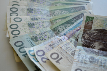 Polish Zloty Banknotes on White Background