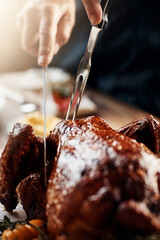 Hands, dinner or carving turkey for thanksgiving celebration, festive holiday or buffet feast....