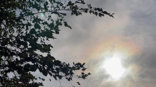 Fast Moving Clouds Magnify and Distort Sun Sphere