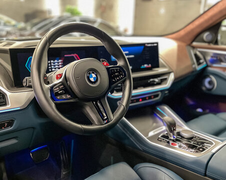 BMW XM 50e new hybrid car from the German brand. Steering wheel, dashboard. BMW XM luxury crossover SUV manufactured by the German automobile manufacturer BMW.