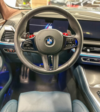 BMW XM 50e new hybrid car from the German brand. Steering wheel, dashboard. BMW XM luxury crossover SUV manufactured by the German automobile manufacturer BMW.