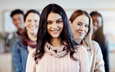 Students, girl and group portrait in university for education, learning and teamwork in classroom. People, group and course in college for scholarship, campus and collaboration with research project