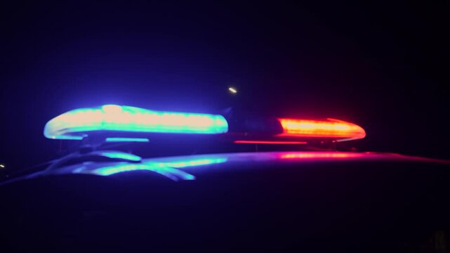  Red and blue lights of a police car close up, stock video footage